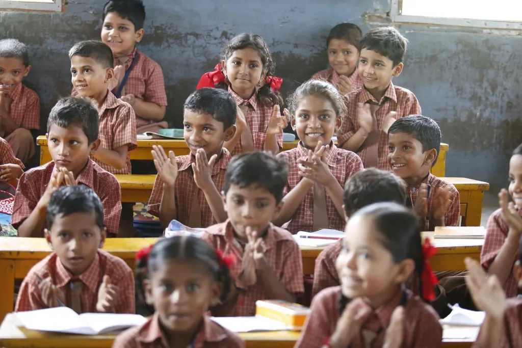 Smiling schoolchildren in a classroom